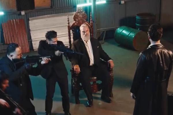 Nick Puya playing the janitor